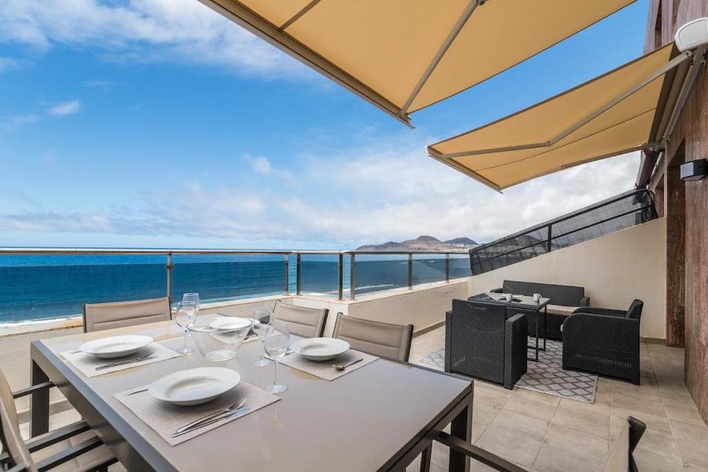 Spacious Two Bedroom Apartment with Terrace right on the Surf Beach