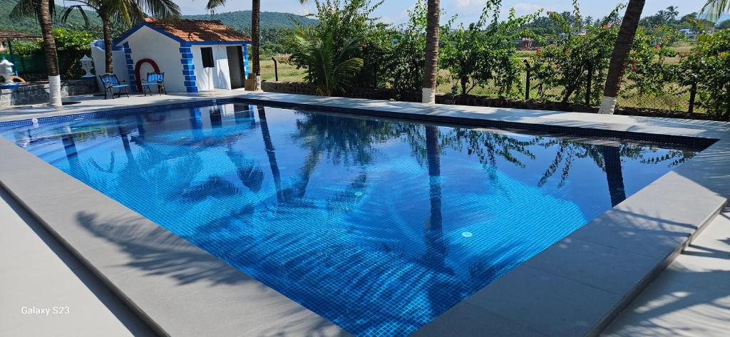 Bazén v ubytování Aqua Arina Holiday Farm House nebo v jeho okolí