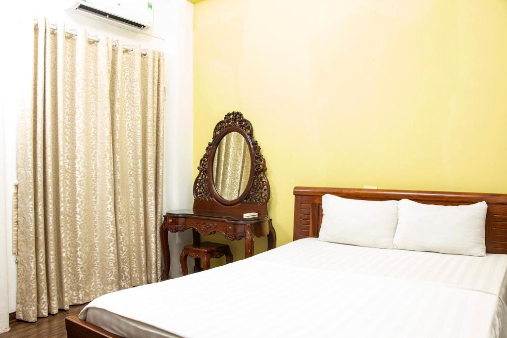 Postel nebo postele na pokoji v ubytování HomeTown Cha Hotel