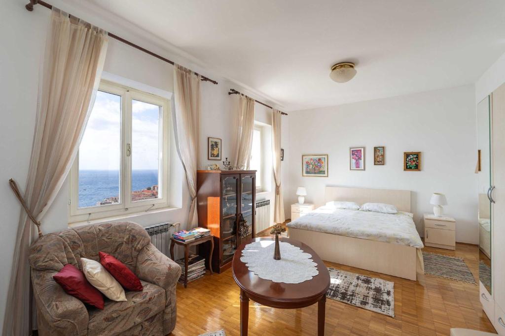 Posteľ alebo postele v izbe v ubytovaní Apartment and Room Cicko