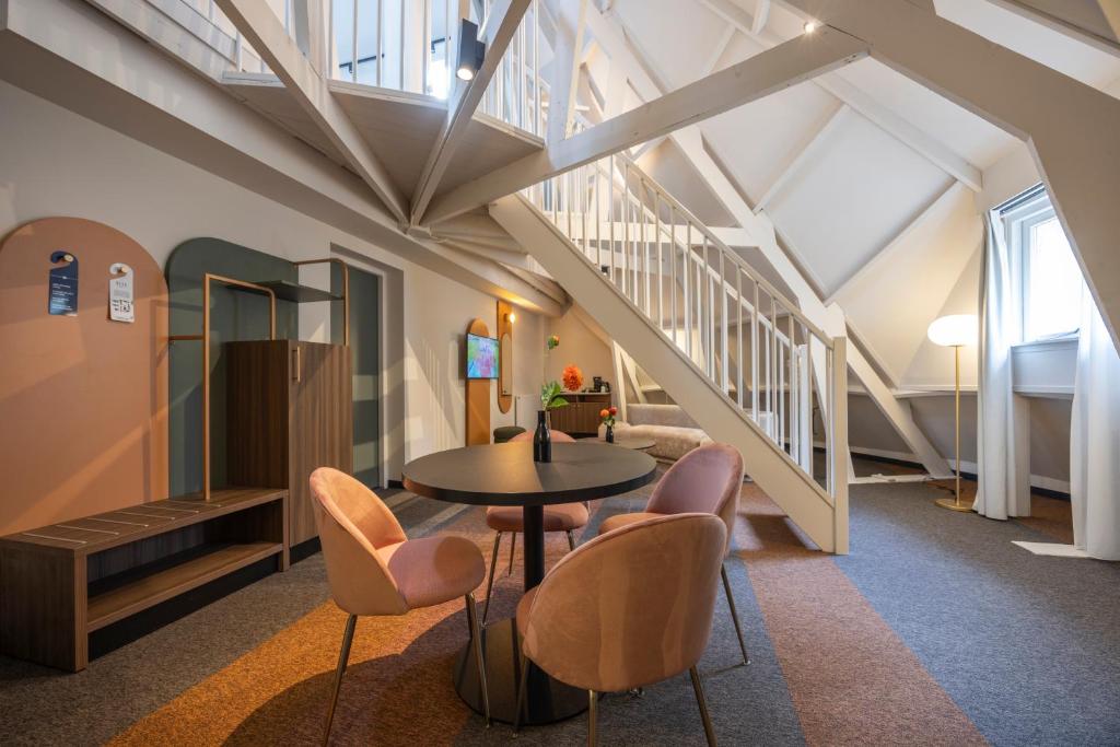 Posezení v ubytování Fletcher Boutique Hotel De Mallejan