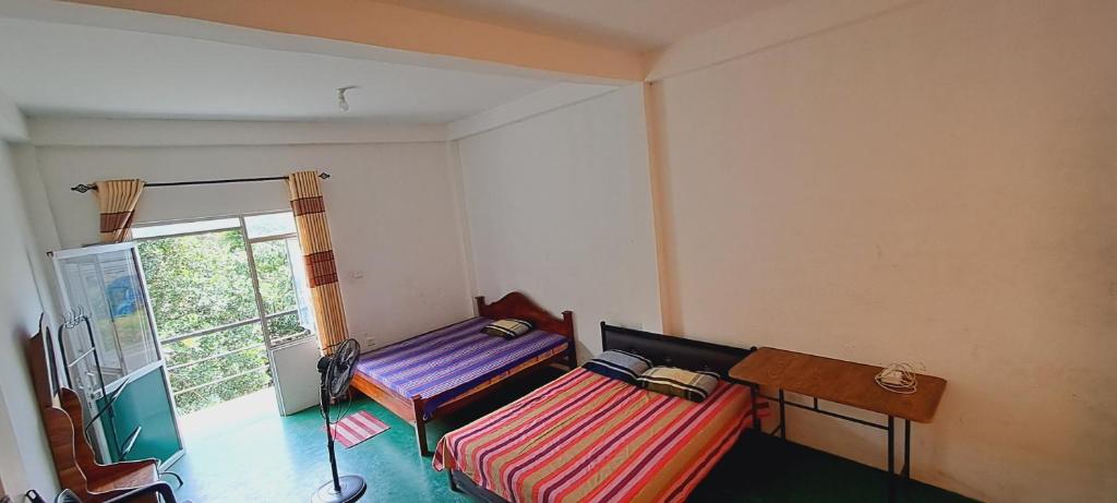 Postel nebo postele na pokoji v ubytování 38 guest house