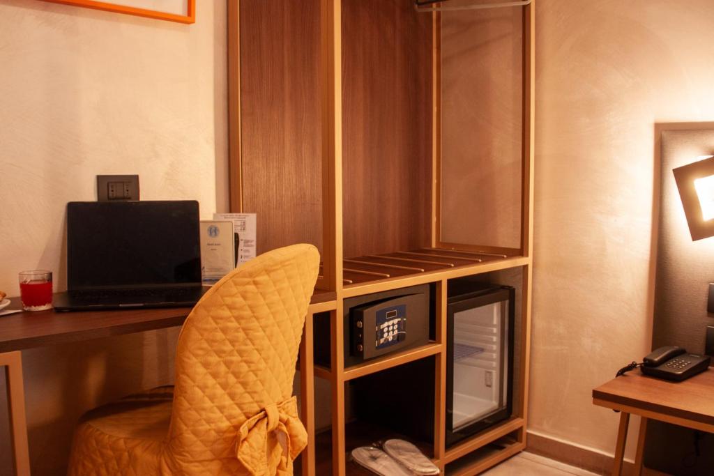 TV a/nebo společenská místnost v ubytování Hotel Assisi