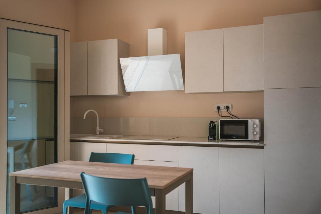 Kuchyň nebo kuchyňský kout v ubytování Villa Aris