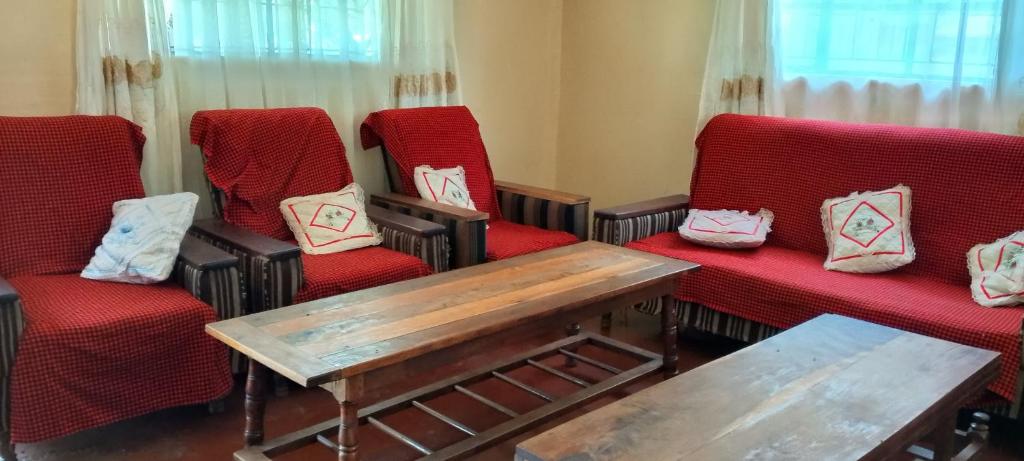 Posezení v ubytování Greenfield Homestay -Full board