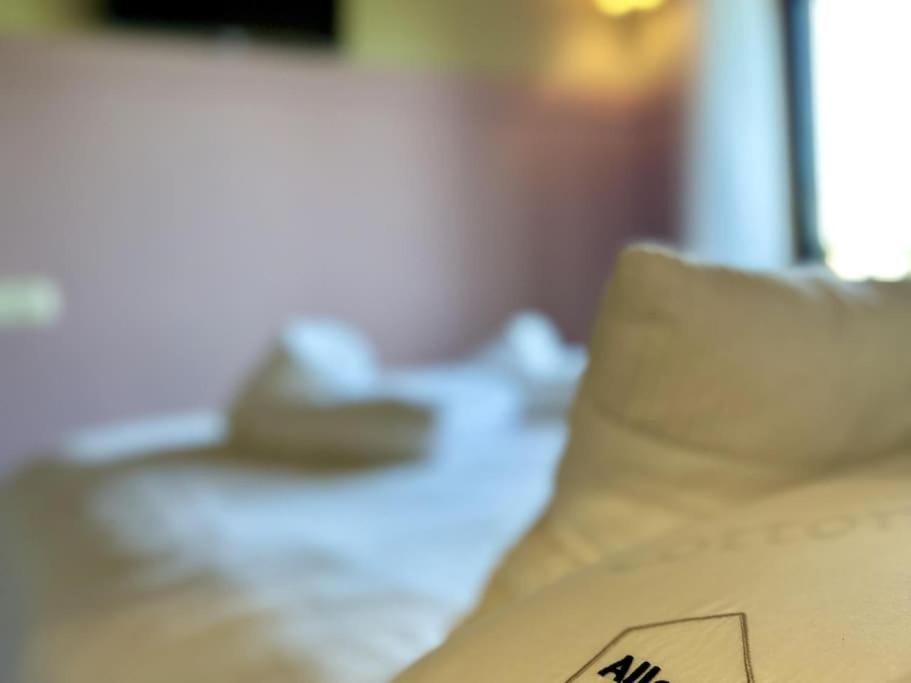 Postel nebo postele na pokoji v ubytování Mas Can Serra, casa a Queixans