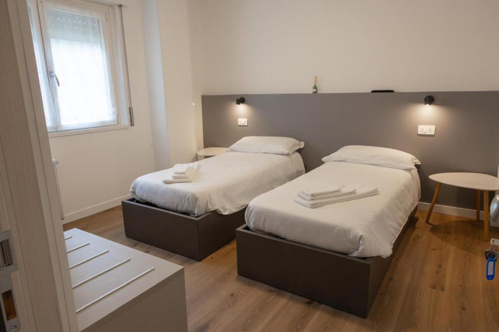 Postel nebo postele na pokoji v ubytování Albergo Panorama