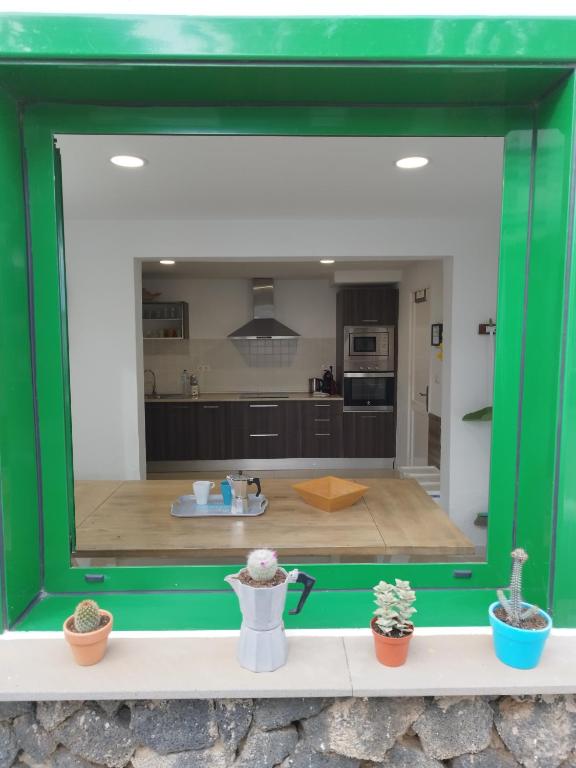 Una cocina o zona de cocina en Vivienda Vacacional Casa del Erizo - Ecofinca
