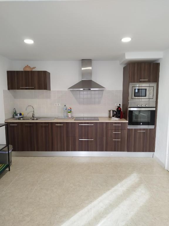 Una cocina o zona de cocina en Vivienda Vacacional Casa del Erizo - Ecofinca