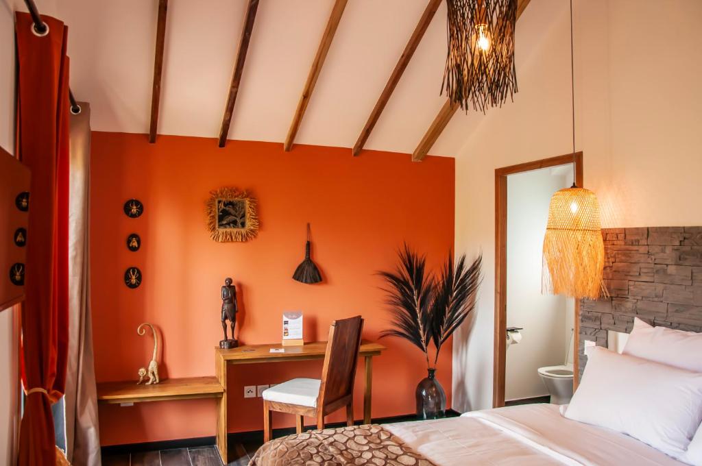 Postel nebo postele na pokoji v ubytování Heritage Ecolodge