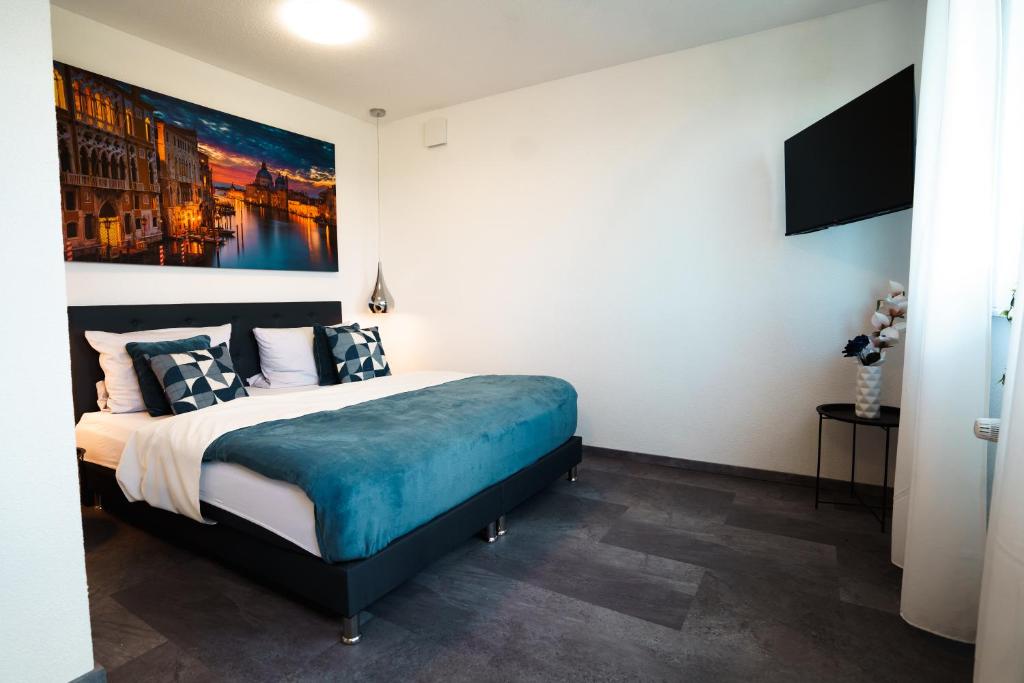 Postel nebo postele na pokoji v ubytování Hotel am Schafbaum