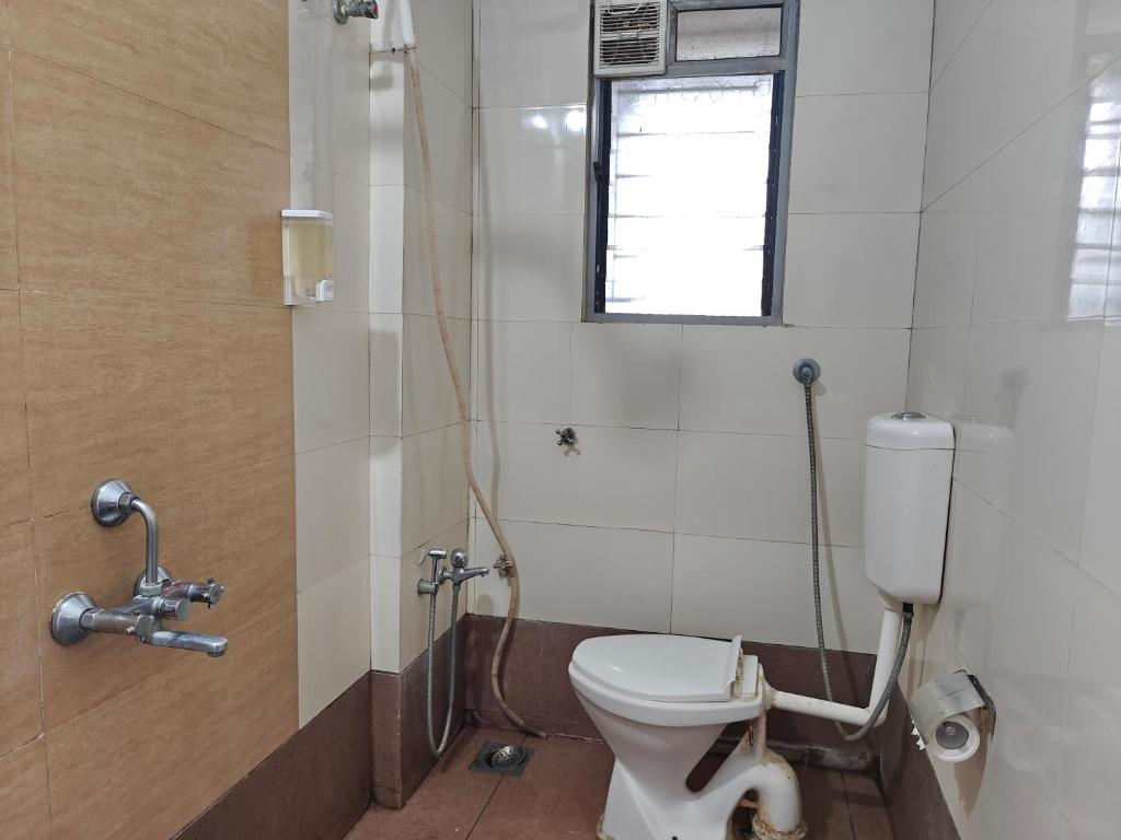 Koupelna v ubytování Chandralok Service Apartments