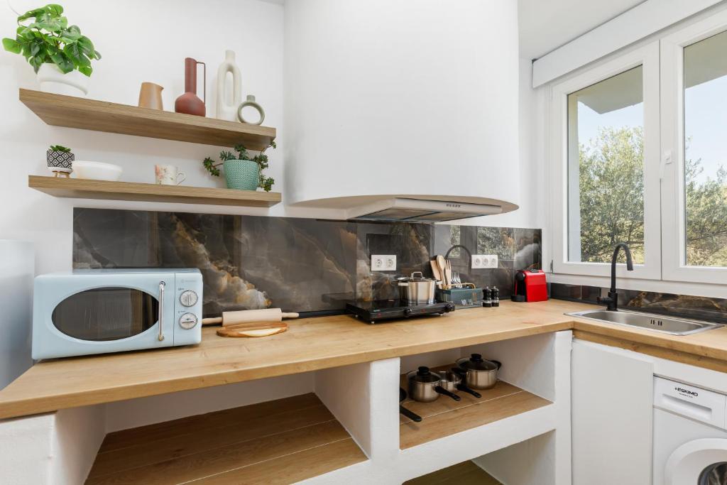 A kitchen or kitchenette at Newly Built All Season Resort