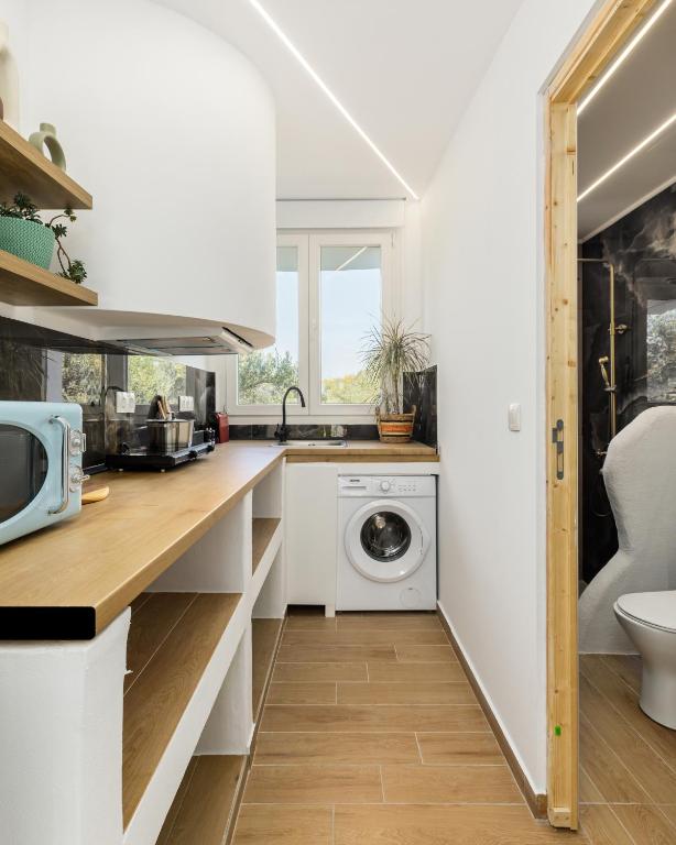 A kitchen or kitchenette at Newly Built All Season Resort