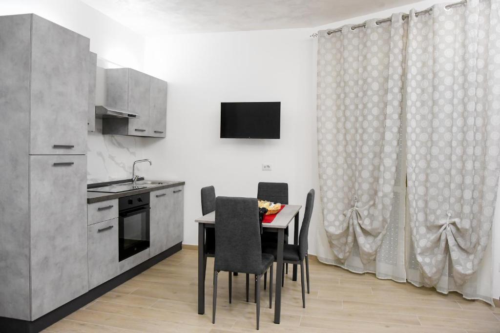 Kuchyň nebo kuchyňský kout v ubytování Giorgina'S Suite