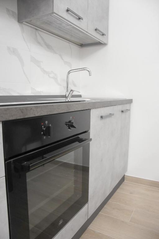 Kuchyň nebo kuchyňský kout v ubytování Giorgina'S Suite