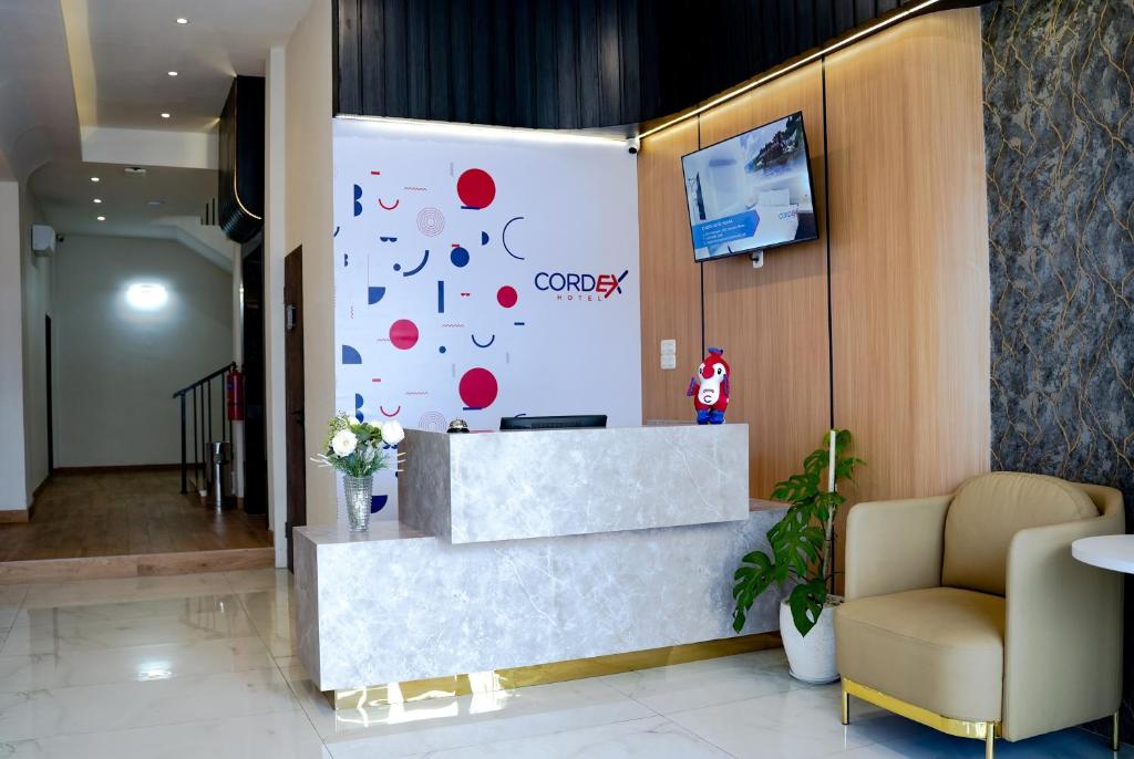 TV a/nebo společenská místnost v ubytování Cordex Hotel Marelan Medan