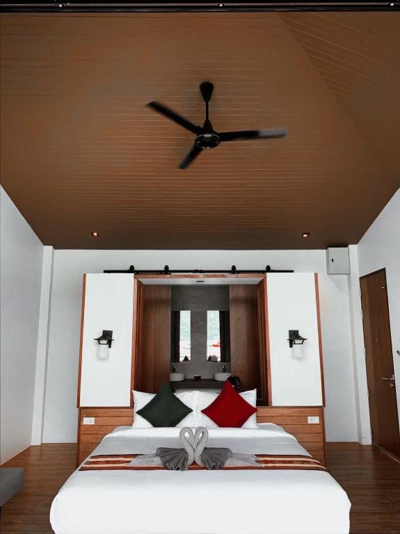 Кровать или кровати в номере Bhuvarin Resort