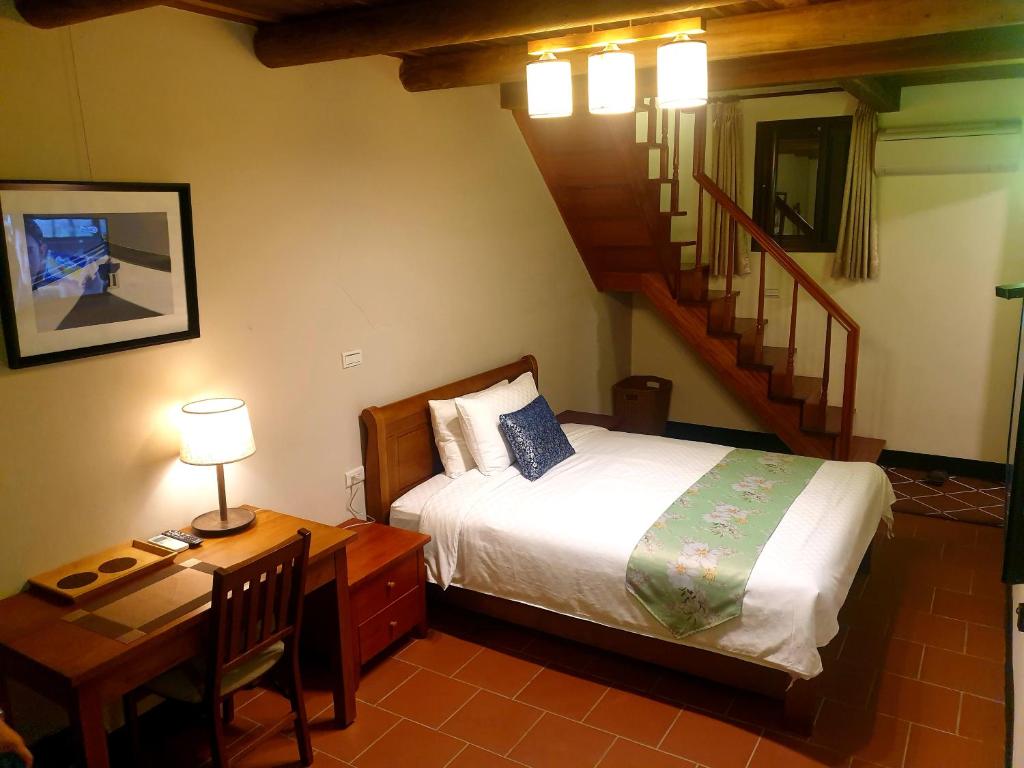 Postel nebo postele na pokoji v ubytování Mount Taiwu Cozy B&B
