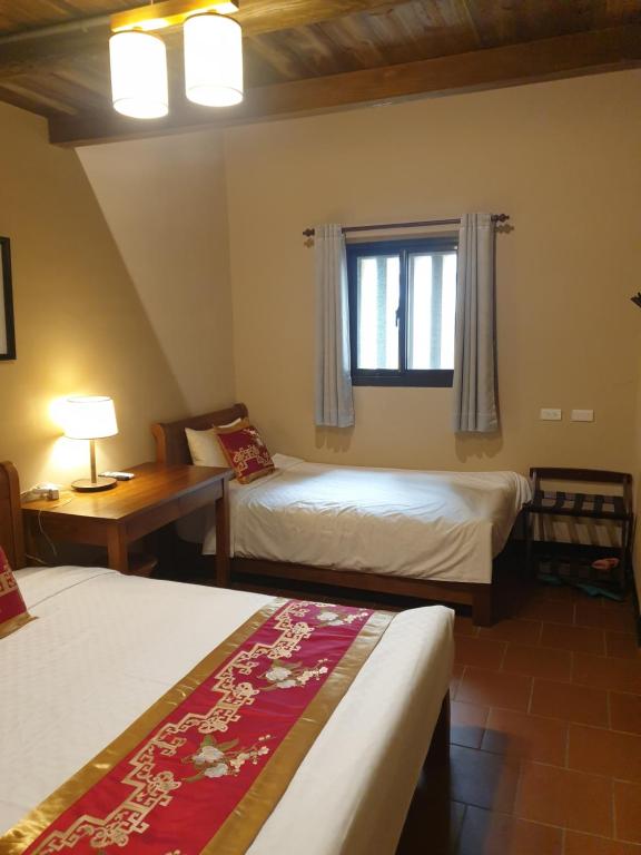 Postel nebo postele na pokoji v ubytování Mount Taiwu Cozy B&B