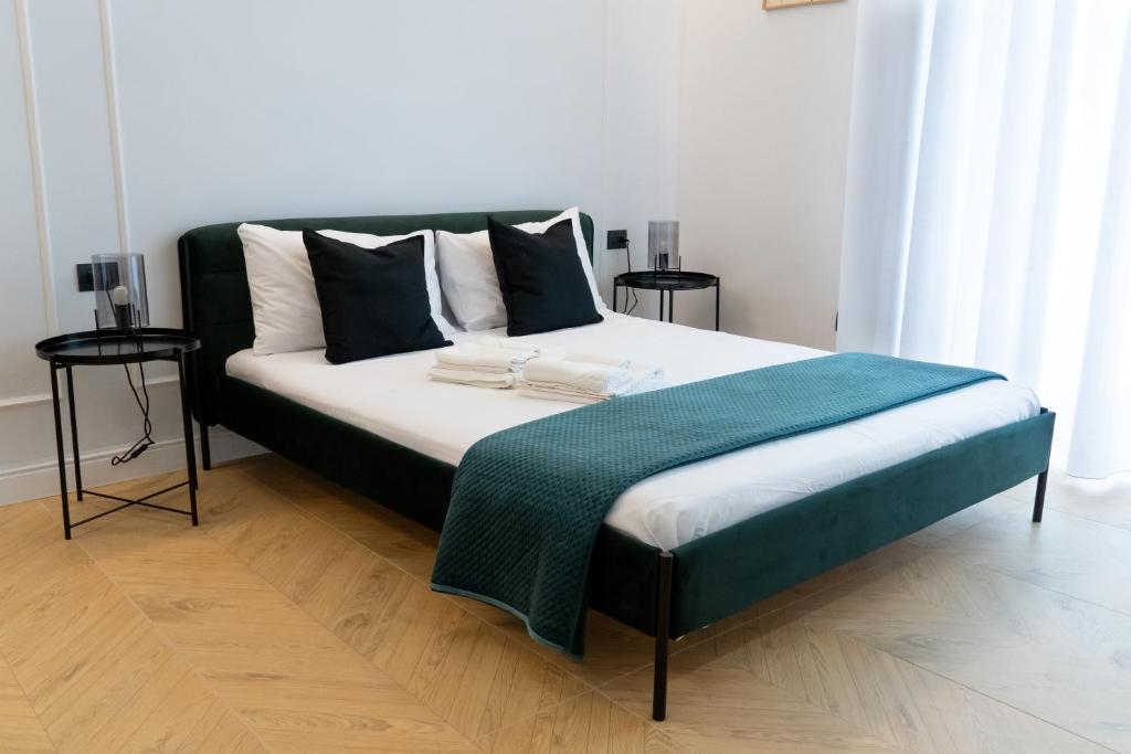 Postel nebo postele na pokoji v ubytování Miglio 43