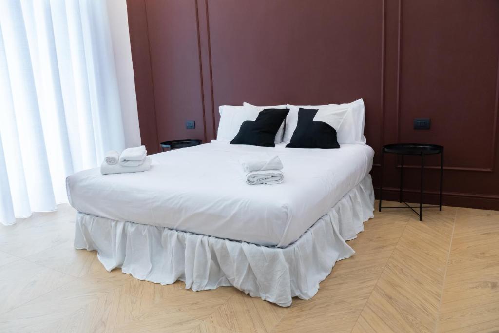 Postel nebo postele na pokoji v ubytování Miglio 43