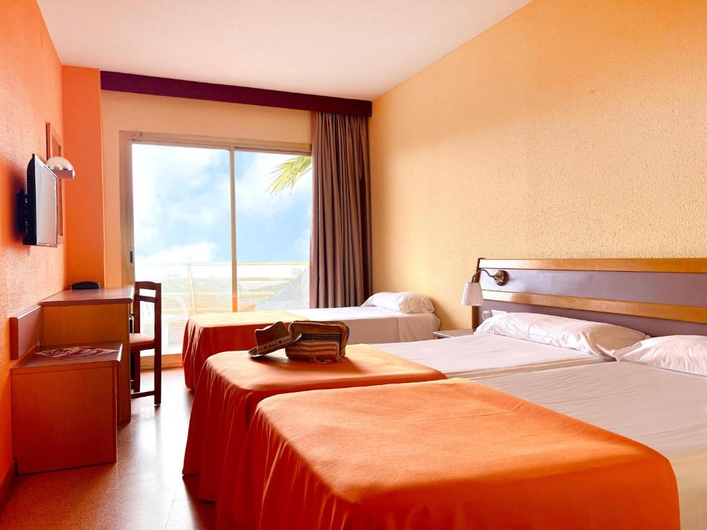 Posteľ alebo postele v izbe v ubytovaní Hotel Mercury by ALEGRIA