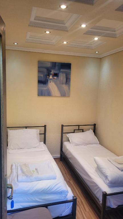 Postel nebo postele na pokoji v ubytování DALLAR Guest House