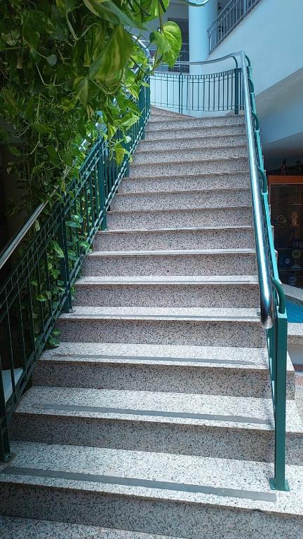 a set of stairs leading up to a building at Pousada dos Girassóis in Palmas