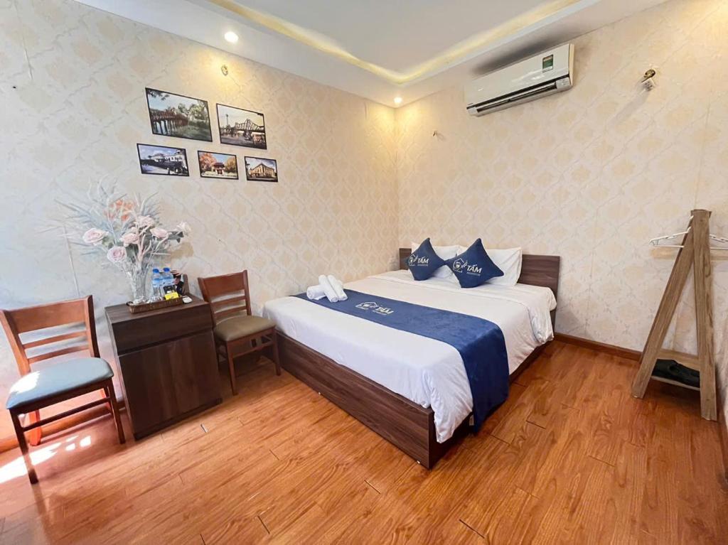 Postel nebo postele na pokoji v ubytování Tấm's House
