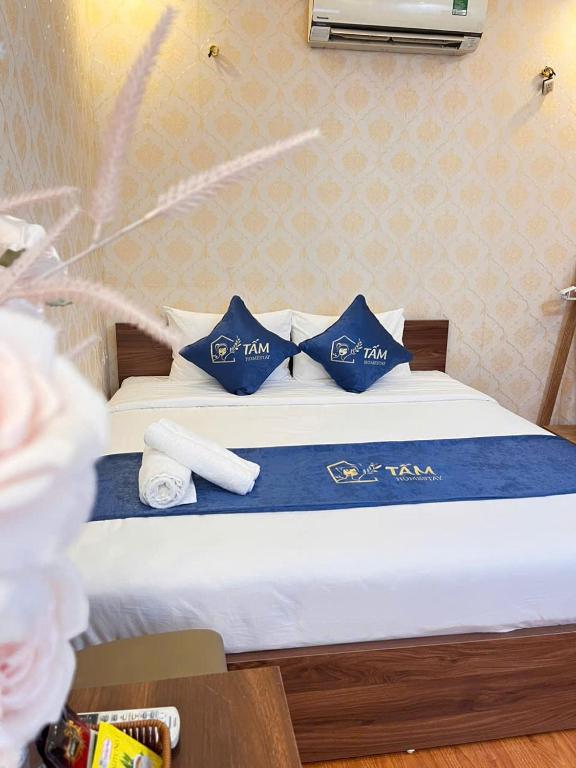 Postel nebo postele na pokoji v ubytování Tấm's House