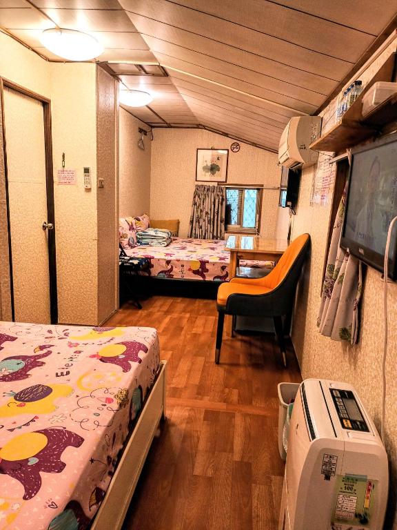 Postel nebo postele na pokoji v ubytování Yun Cheng Homestay