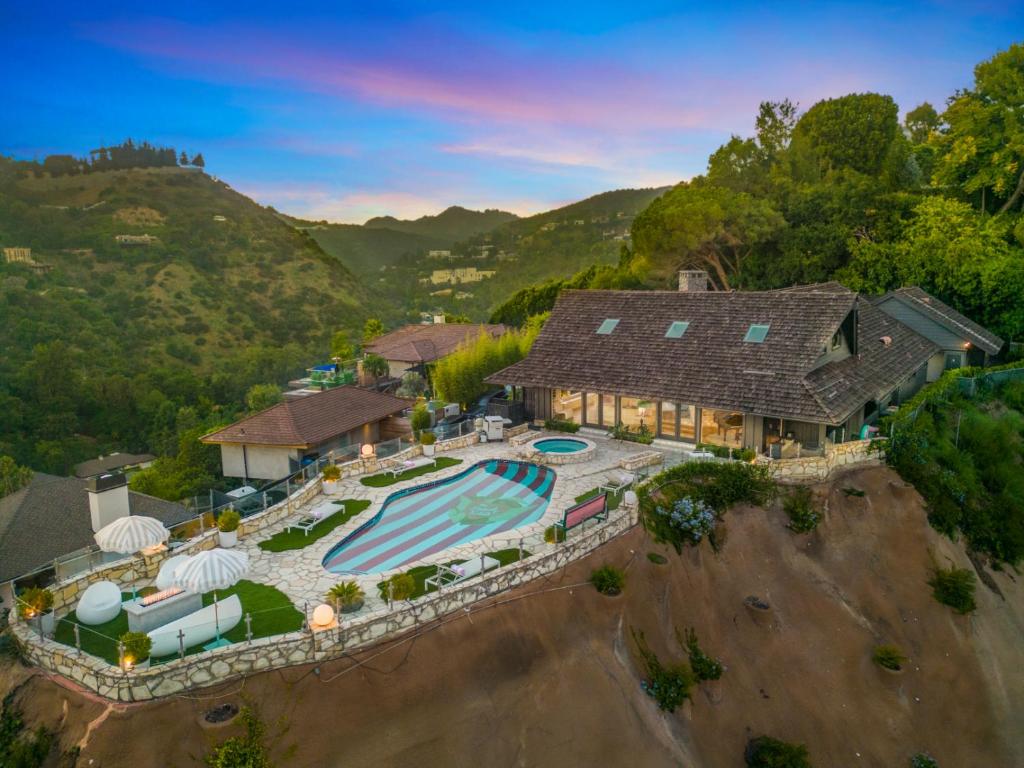 an aerial view of a house with a swimming pool at Beverly Tree House in Los Angeles