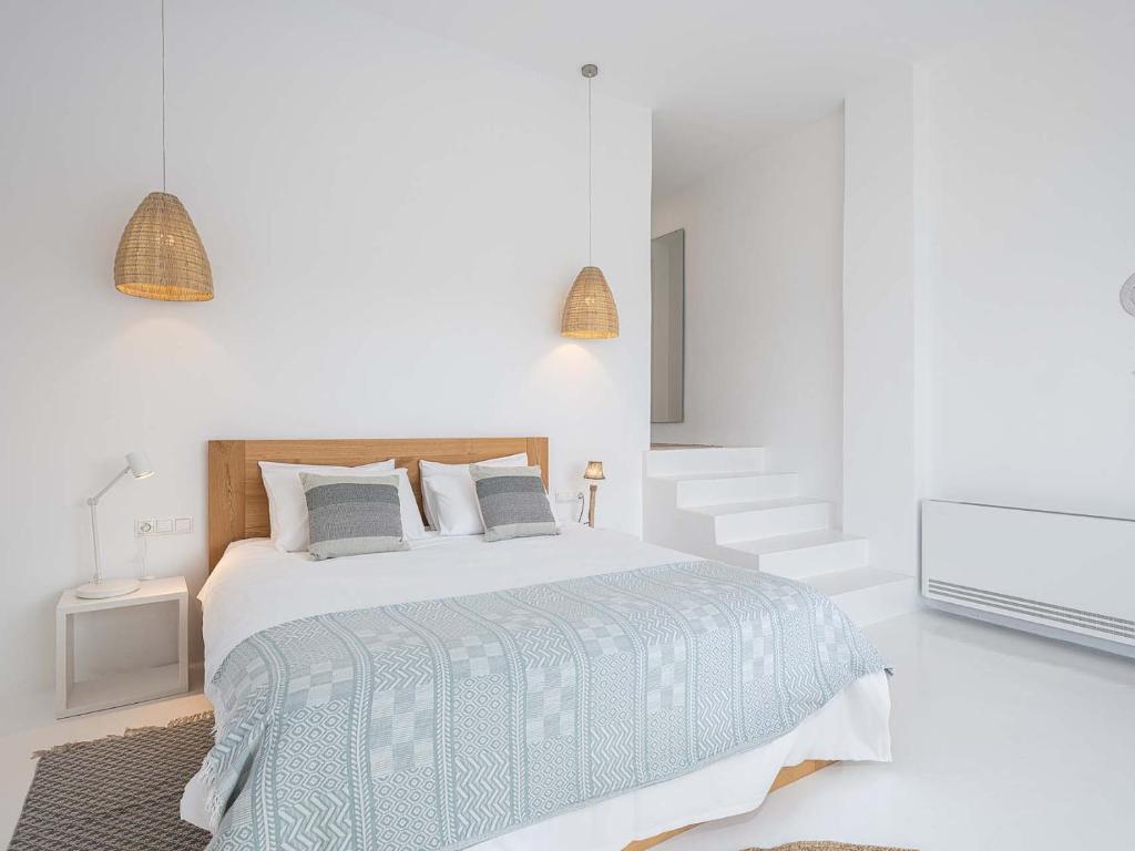 A bed or beds in a room at Villa Kyma