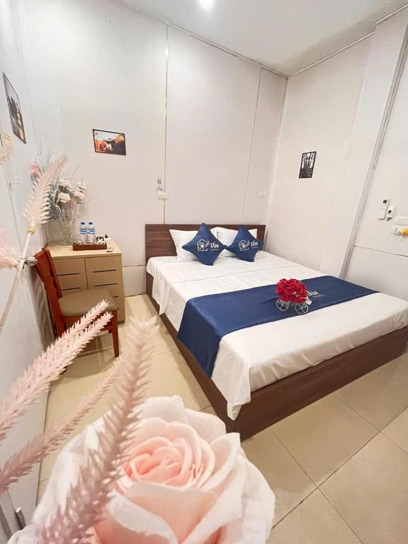 Postel nebo postele na pokoji v ubytování Tấm's House