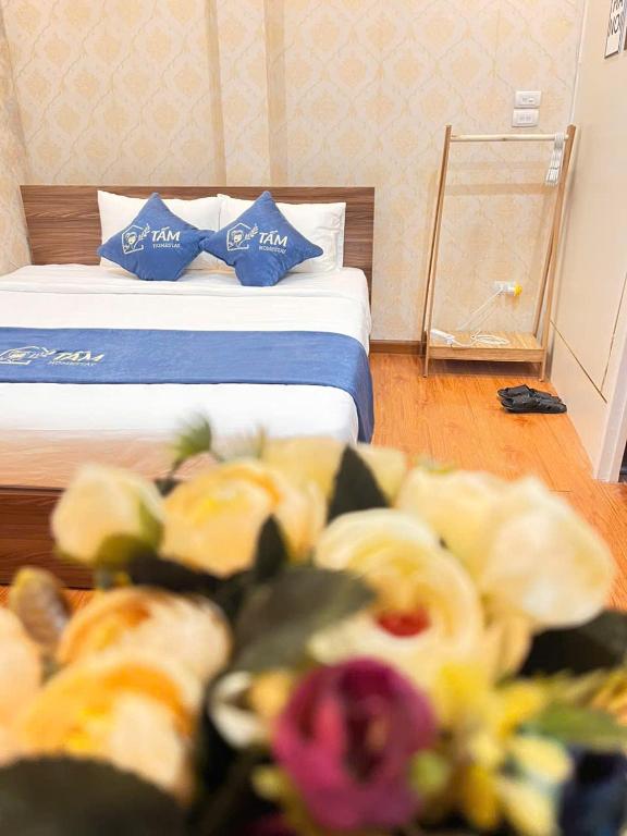Postel nebo postele na pokoji v ubytování Tấm's House