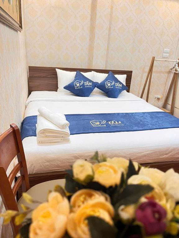 Postel nebo postele na pokoji v ubytování Tấm's House