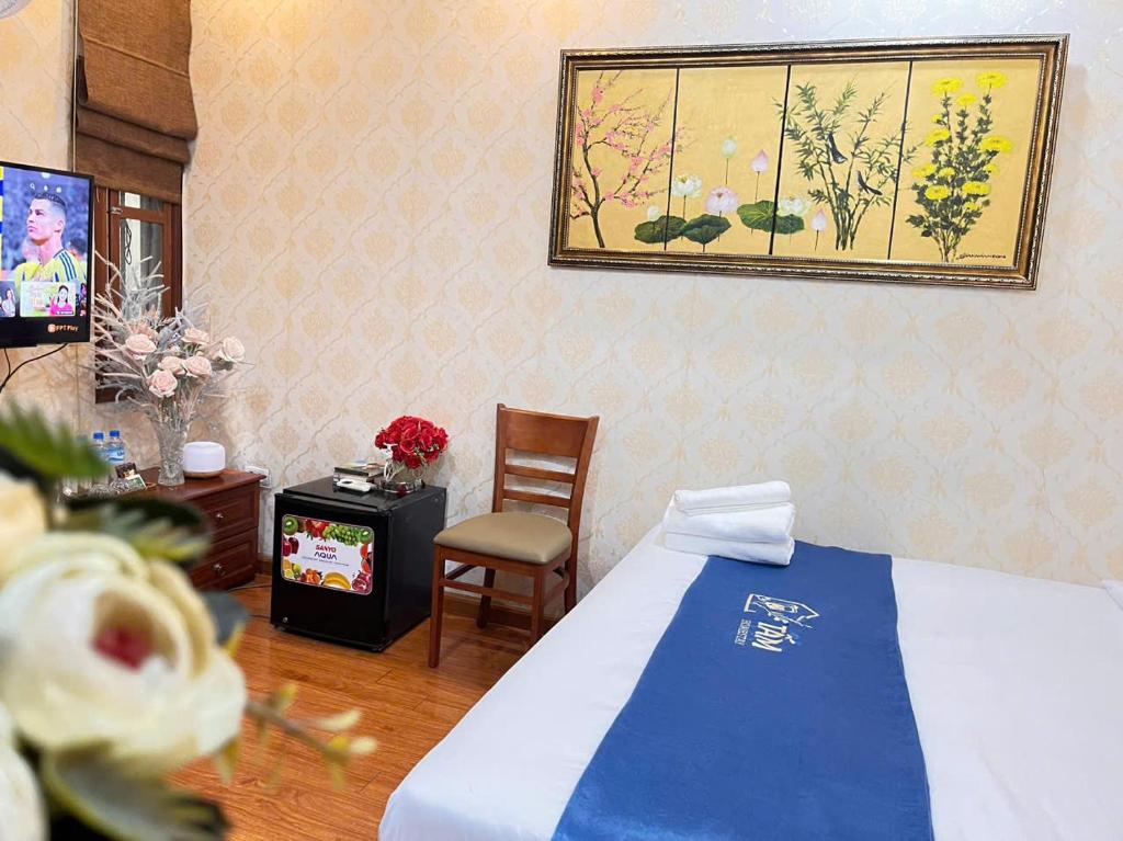 Postel nebo postele na pokoji v ubytování Tấm's House