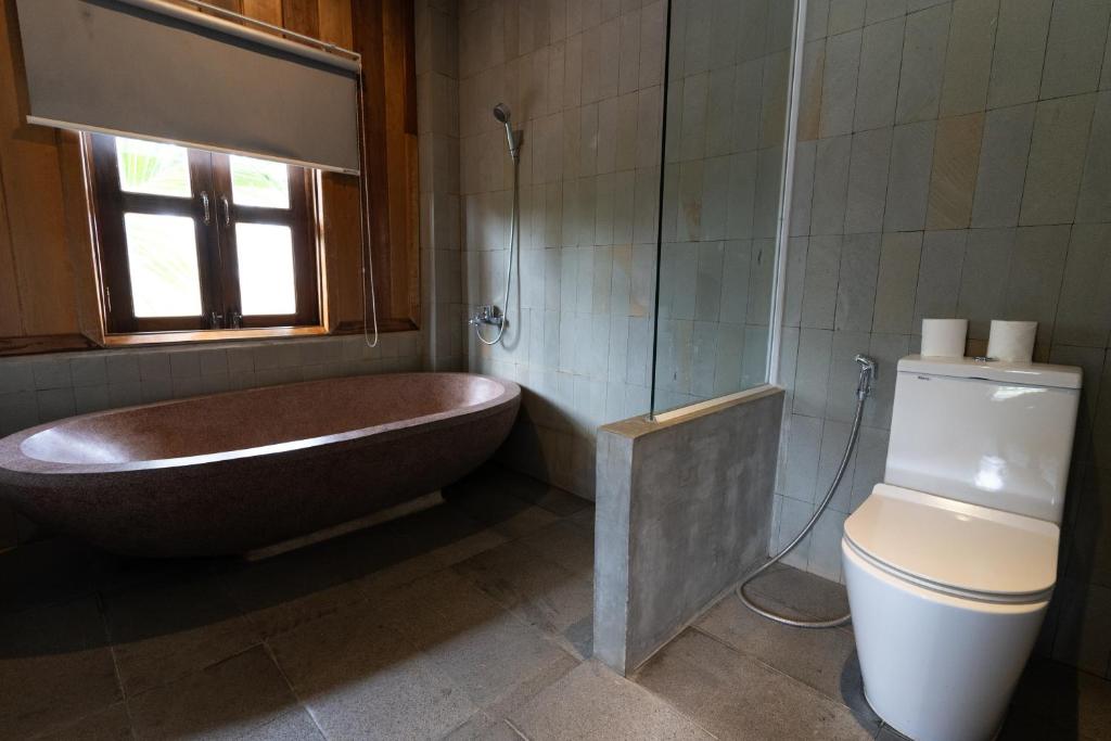 Koupelna v ubytování Villa Isann