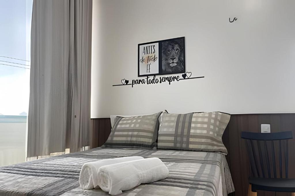 Postel nebo postele na pokoji v ubytování Apartamentos Vitória