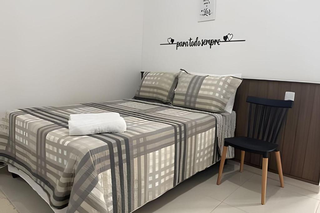 Postel nebo postele na pokoji v ubytování Apartamentos Vitória