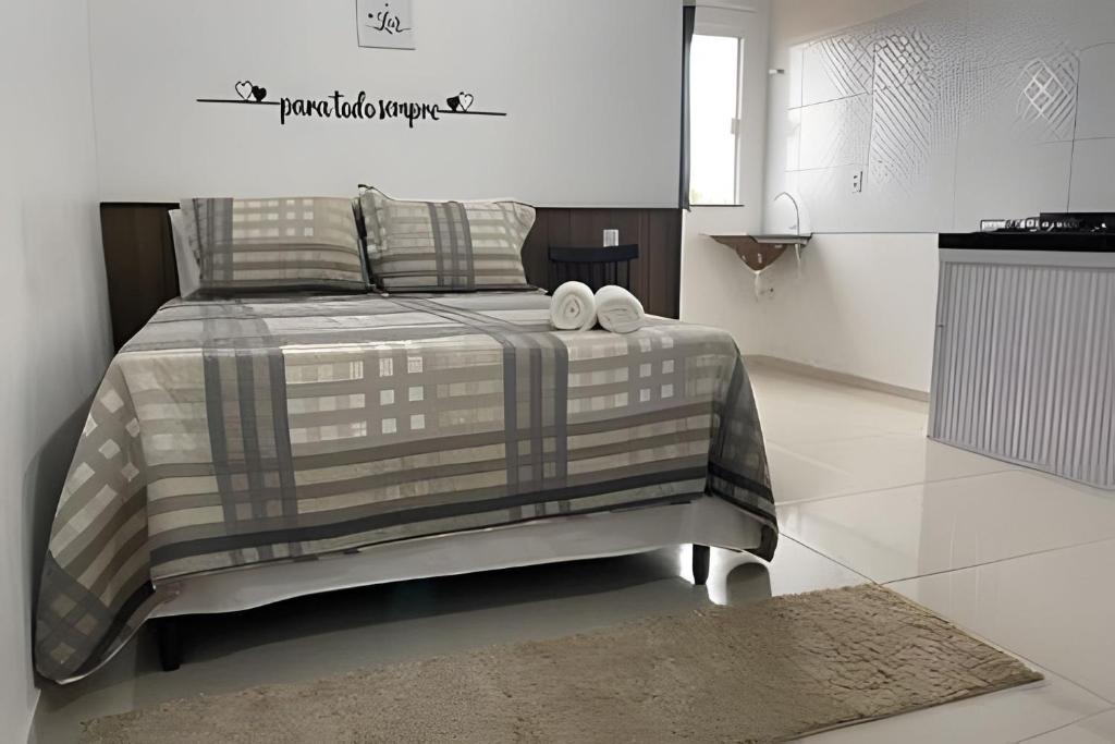 Postel nebo postele na pokoji v ubytování Apartamentos Vitória