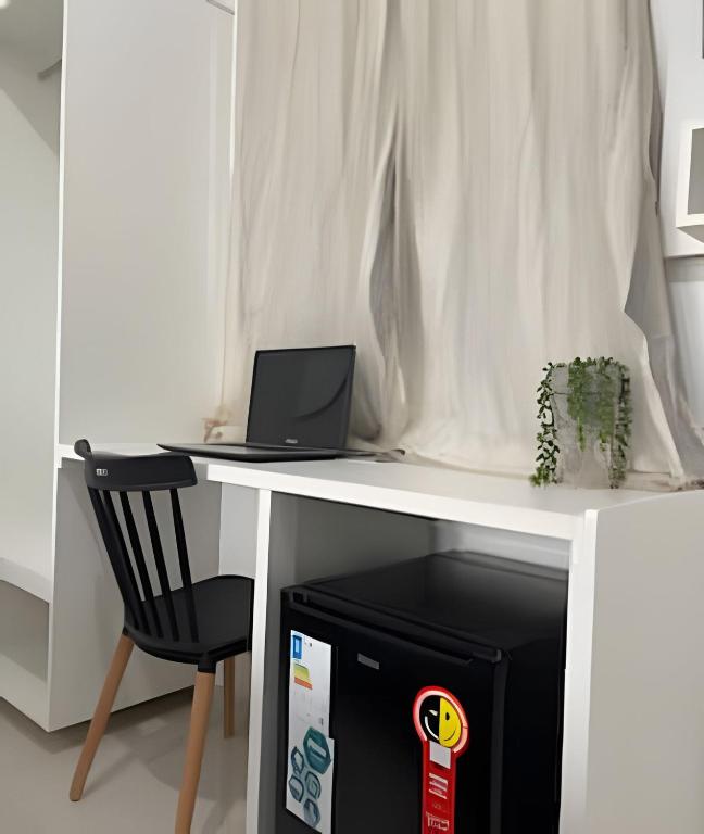 TV a/nebo společenská místnost v ubytování Apartamentos Vitória