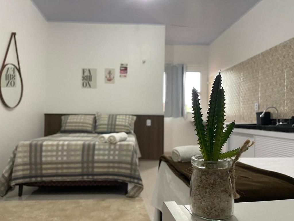 Postel nebo postele na pokoji v ubytování Apartamentos Vitória