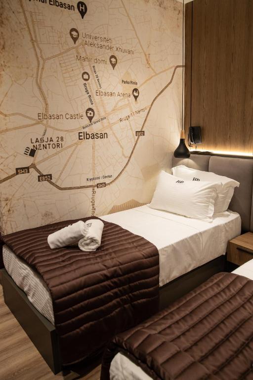 Postel nebo postele na pokoji v ubytování Dial Hotel