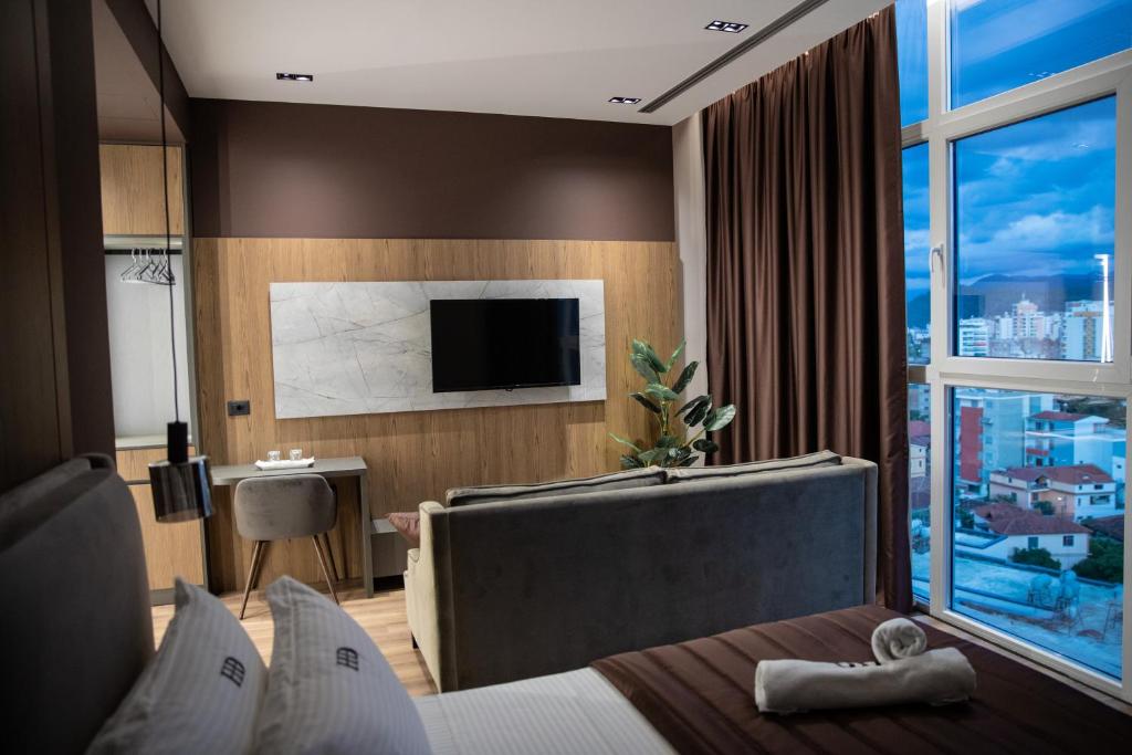 TV a/nebo společenská místnost v ubytování Dial Hotel