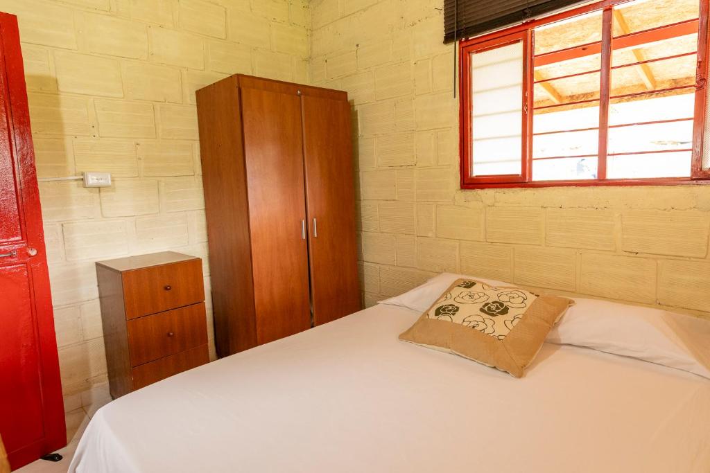 Postel nebo postele na pokoji v ubytování Finca Villa Arca