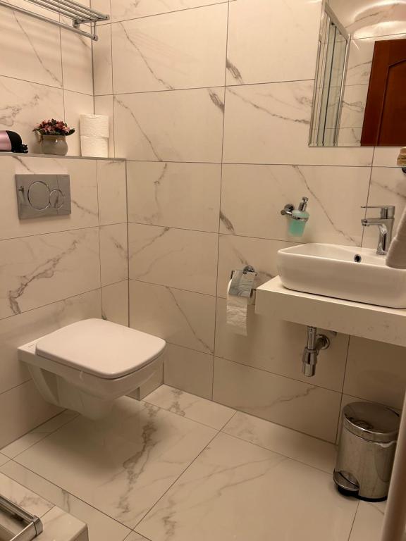 Koupelna v ubytování Hotel Evan u Hoffera