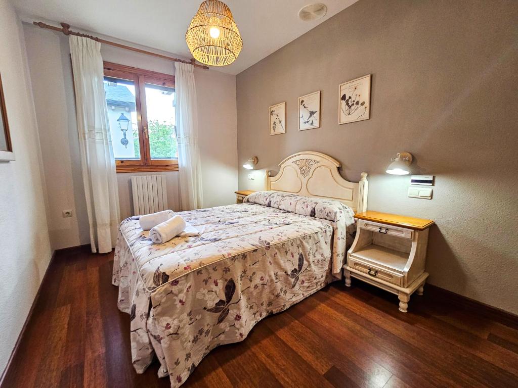 Postel nebo postele na pokoji v ubytování Apartamentos Casa Boira 3000