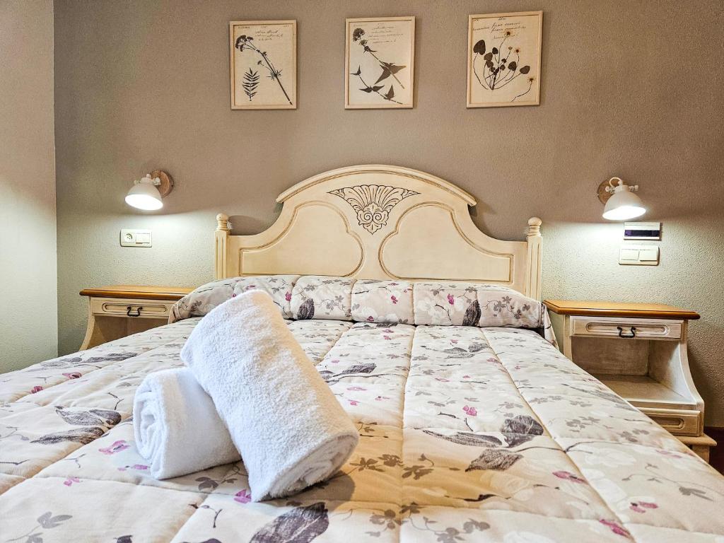 Postel nebo postele na pokoji v ubytování Apartamentos Casa Boira 3000